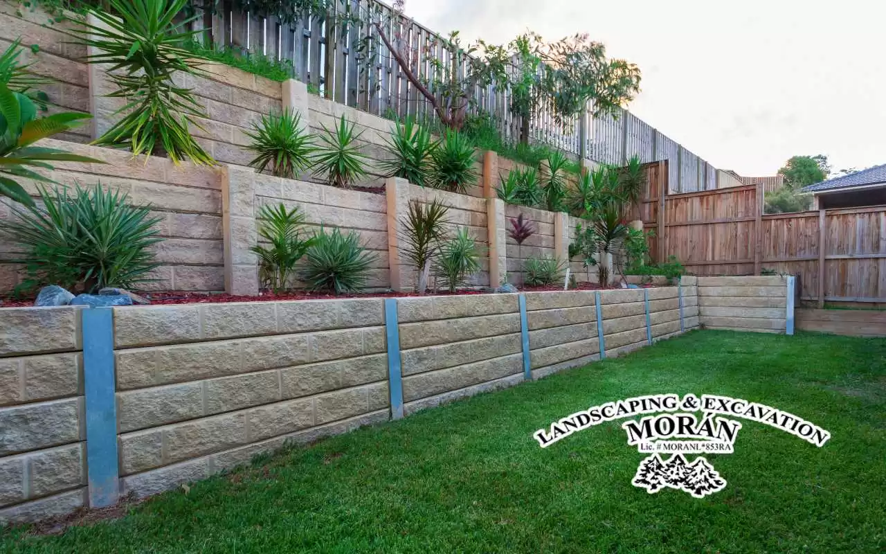 Durable and robust retaining wall constructed from railroad ties